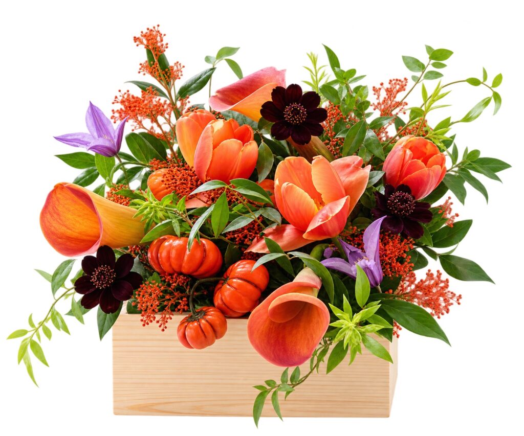 Autumn Harvest orange floral arrangement with purple accents in a natural wooden box on a white background
